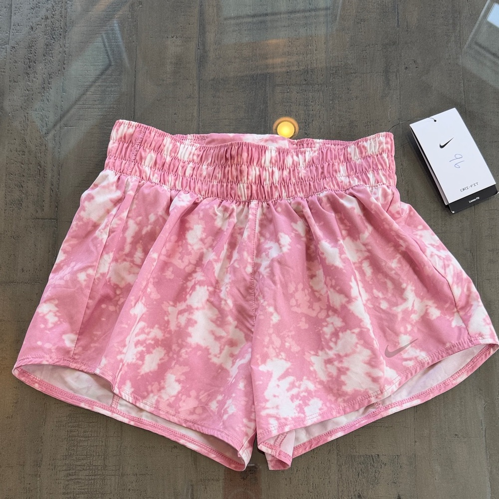 NWT. Nike Women's Athletic Pink Shorts. Size XS. Has liner